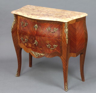 A French inlaid Kingwood commode of bombe form with pink veined marble top above 2 drawers with gilt metal mounts throughout, 58cm x 87cm x 43cm 