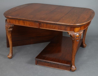 A 1930's Queen Anne style walnut extending dining table raised on cabriole supports with 2 extra leaves, 72cm h x 116cm w x  137cm l when closed x 242cm when extended 