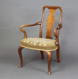 A Jas. Shoolbred & Co Queen Anne style walnut slat back carver chair with Berlin woolwork seat, raised on cabriole supports
