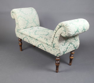 A Georgian style window seat upholstered in green material, raised on turned supports 68cm h x 119cm w x 42cm d 