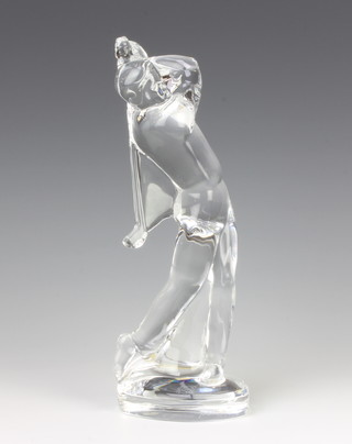 A clear glass Baccarat figure of a golfer 24cm 
