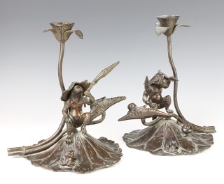 A pair of 19th Century Japanese bronze candlesticks in the form of the water imp Kappa on lily pads with seated toads and snails 28cm h x 20cm 
