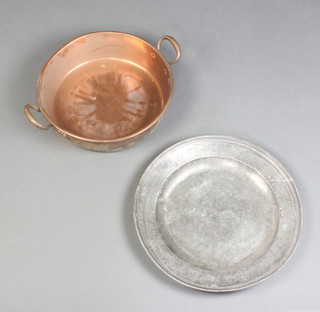 A copper twin handled preserving pan 38cm together with a pewter charger 46cm (some corrosion) 