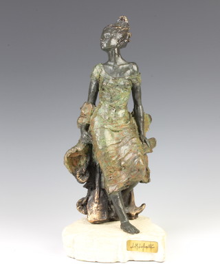 After L M Lafuente, a Spanish limited edition bronze figure of a lady seated by a rocky outcrop 37cm x 14cm x 13cm 