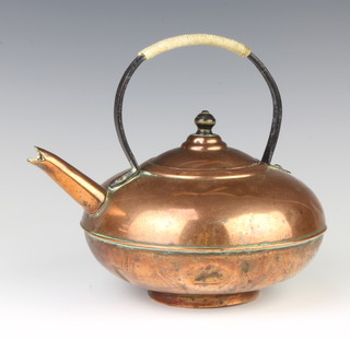 A Dresser style circular copper kettle with iron handle 9cm x 20cm 