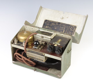 A military issue field telephone incorporating a morse key 
