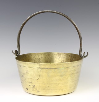 A circular brass preserving pan with polished steel swing handle 11cm h x 24cm diam. 