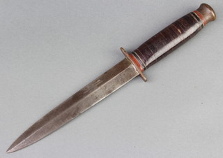 A Taylor eye witness double bladed fighting dagger, the 17cm blade marked Taylors Witness Sheffield England, there is no scabbard  