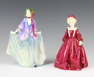 A Royal Doulton figure - Sweet Dreams HN1318 19cm and a Royal Worcester figure - Grandmother's Dress 3081 16cm  
