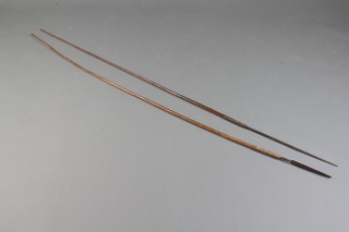 A spear with 20cm double edged leaf shaped blade together with 1 other spear with a 39cm blade 