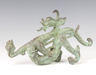 A Chinese bronze figure of a dragon 12cm h x 22cm w x 5cm d
