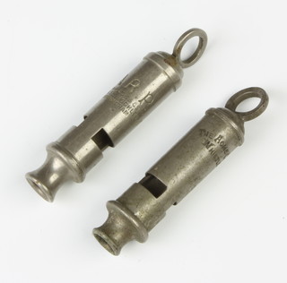 An ARP whistle together with a Acme city whistle (2) 