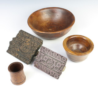 Two rectangular Batik printing blocks 7cm x 15cm x 14cm and 6cm x 15cm x 11cm, a turned oak bowl 10cm x 7cm, 1 other walnut bowl 10cm x 15cm and a cylindrical vase 9cm x 7cm 