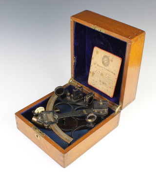 A Hezzanith R465 sextant complete with certificate dated 12th November 1946, contained in an oak carrying case 
