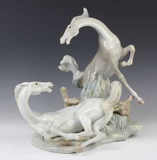 An impressive Lladro group of 2 horses playing 37cm 