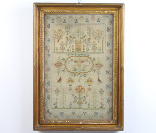 19th Century sampler with a country house, statuary and trees in a formal floral border with birds flowers and trees by Sarah Bennett 1804 43cm x 29cm 