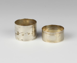 A silver napkin ring Birmingham 1992 and an engine turned ditto, 30 grams