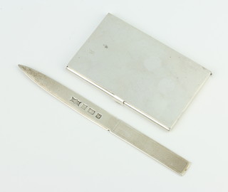 A commemorative silver paper knife, Birmingham 1977 and a silver card case 92 grams