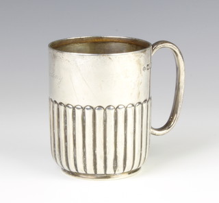 An Edwardian silver demi-fluted mug by Henry Wilkinson & Co, London 1903, 9cm, 143 grams
