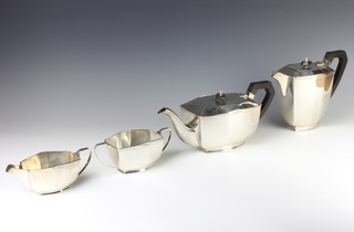 A silver Art Deco 4 piece tea and coffee set, Sheffield 1932, with ebony mounts, gross weight 1851 grams 
