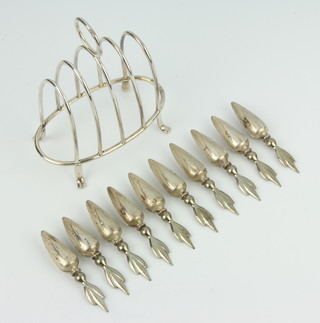 A silver 5 bar toast rack and 10 sterling silver sweetcorn picks, 93 grams gross 