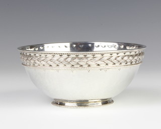 A Liberty & Co hammer pattern silver bowl with rope twist rim, Birmingham 1912, 11.5cm, 161 grams 