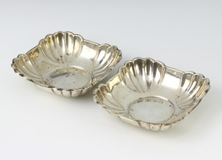 A pair of square scalloped sterling silver dishes 10cm, 122 grams