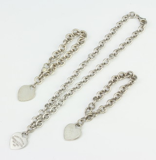 A fancy link silver necklace and 2 bracelets, 125 grams 