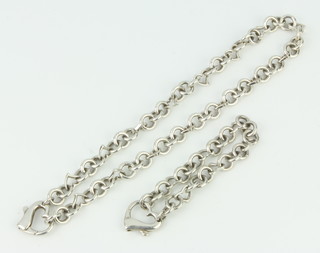 A silver heart shaped bracelet and necklace, 65 grams