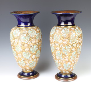 A pair of Doulton Slaters oviform vases decorated with flowers 40cm 