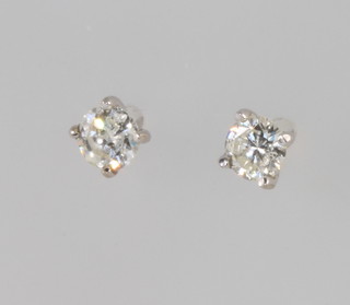A pair of 18ct white gold brilliant cut diamond ear studs, approx. 0.6ct 