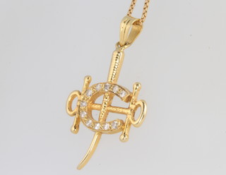 An 18ct yellow gold diamond set pendant and chain 4.6 grams 