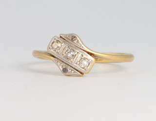 An 18ct yellow gold crossover diamond ring 2.3 grams, size L 