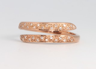 A 9ct rose gold diamond set ring 2.7 grams, size P 