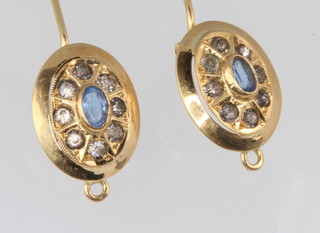 A pair of 18ct yellow gold sapphire set oval earrings 2.6 grams 
