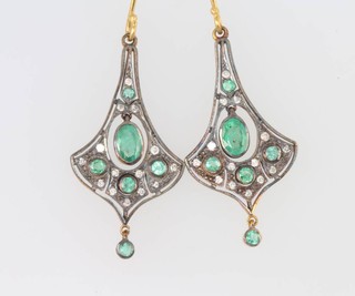 A pair of silver gilt Edwardian style emerald and diamond drop earrings 