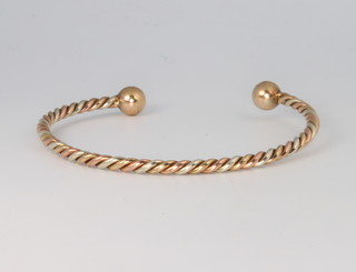 A 9ct yellow gold rope twist torque bangle 12.3 grams 