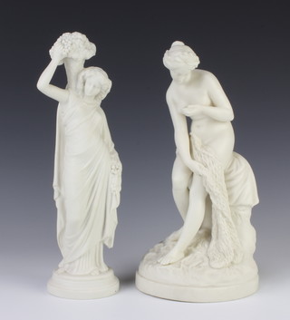 A Victorian Parian style figure of a semi-clad lady sitting on a rock with a shell in her hand 27cm, a ditto of a lady carrying grapes and vines 30cm 
