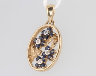 A 9ct yellow gold sapphire and diamond pendant 25mm, 2.1 grams 