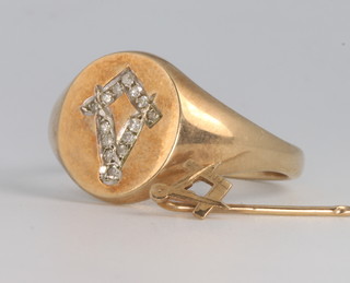 A gentleman's 9ct yellow gold diamond set Masonic ring together with a ditto tie pin 10.1 grams