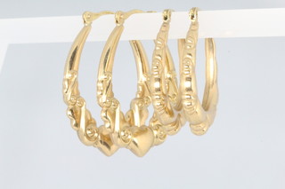 Two pairs of 9ct yellow gold half hoop earrings 3.4 grams 