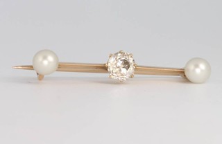 A yellow gold brilliant cut diamond and pearl bar brooch, the centre diamond approx 0.5ct, 32mm 