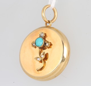 An Edwardian 15ct yellow gold turquoise and diamond circular locket 9 grams 