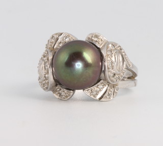 A white gold, grey pearl and diamond dress ring size O 