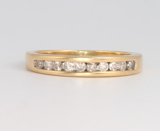 An 18ct yellow gold gem set diamond ring 2.3 grams, size L 