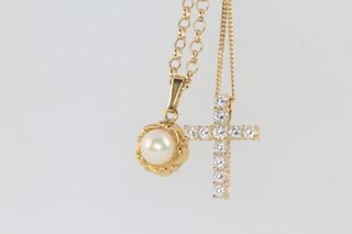An 18ct white gold diamond set cross and chain 0.5ct, together with a 9ct yellow gold pearl pendant and chain 