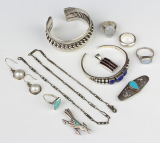 A silver bangle and minor silver jewellery 174 grams 