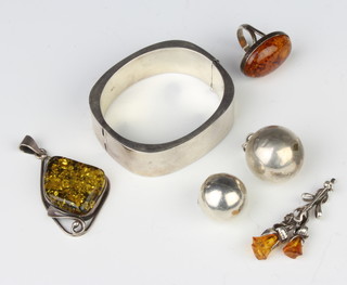 A silver bangle and minor silver jewellery 94 grams 