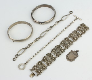 A silver bracelet and minor silver jewellery 105 grams