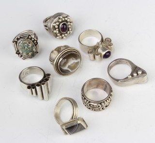 A silver dress ring size M and 7 others, 145 grams